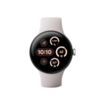 Round smartwatch with a pale pink band displaying time and activity widgets on a black screen
