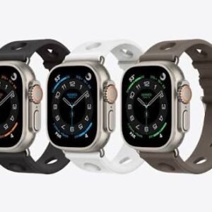 img_7324 - The Phonepreneur Global Four smartwatches with square screens and varied band colors (black, white, gray, brown) lined up on a light background.