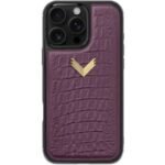 img_8339 - The Phonepreneur Global Purple crocodile-textured iPhone case with a gold chevron emblem on a black bumper edge
