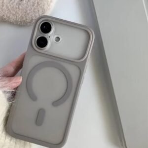 Gray phone case with a circular ring grip on the back, held by a hand near a laptop lid/edge.