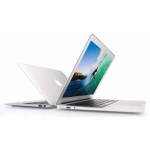 Two silver laptops on a white background, one open showing a blue-green ocean wallpaper and the other closed beside it.