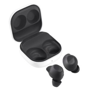 White wireless earbuds with charging case, case open and two earbuds placed nearby, showing the inner charging slots.