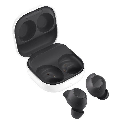 White wireless earbuds with charging case, case open and two earbuds placed nearby, showing the inner charging slots.