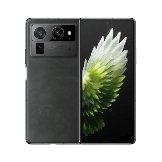 Foldable smartphone shown split open: front display with a green flower wallpaper and a rear panel with a multi‑camera module.
