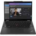 Open black ThinkPad laptop displaying a video enhancement software interface with a video preview and adjustment sliders on screen.