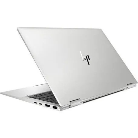 Silver HP laptop partially open on a white background, showing the keyboard and side ports.
