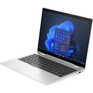 Silver laptop opened at an angle, showing a Windows desktop with the Start menu on the screen.