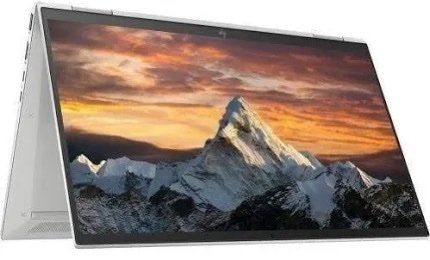2-in-1 laptop with kickstand open, displaying a snowy mountain peak at sunset on the screen