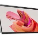 2-in-1 convertible laptop in tent mode with colorful abstract wallpaper on the screen