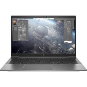 Open silver laptop on a white background, displaying a space-themed 3D rendering with editing panels visible on the screen.