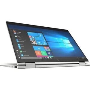 Silver 2-in-1 laptop open in laptop mode, screen showing Windows 10 start menu and desktop